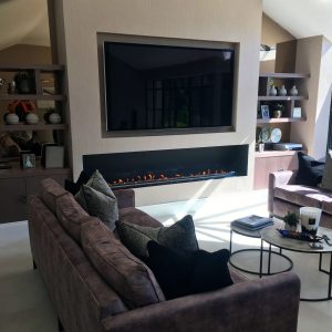 Media Wall with Bio-ethanol fire and shelving either side of chimney breast