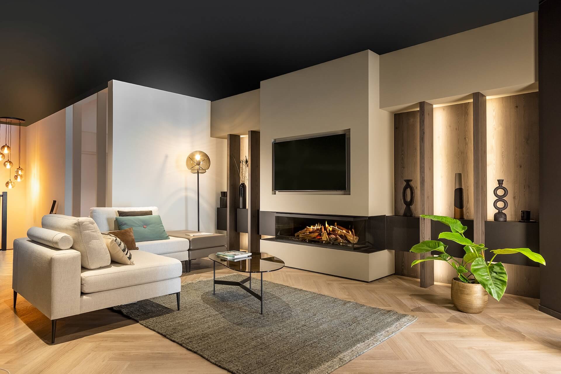 media wall featuring the kalfire e-one 130s three-sided luxury holographic electric fire